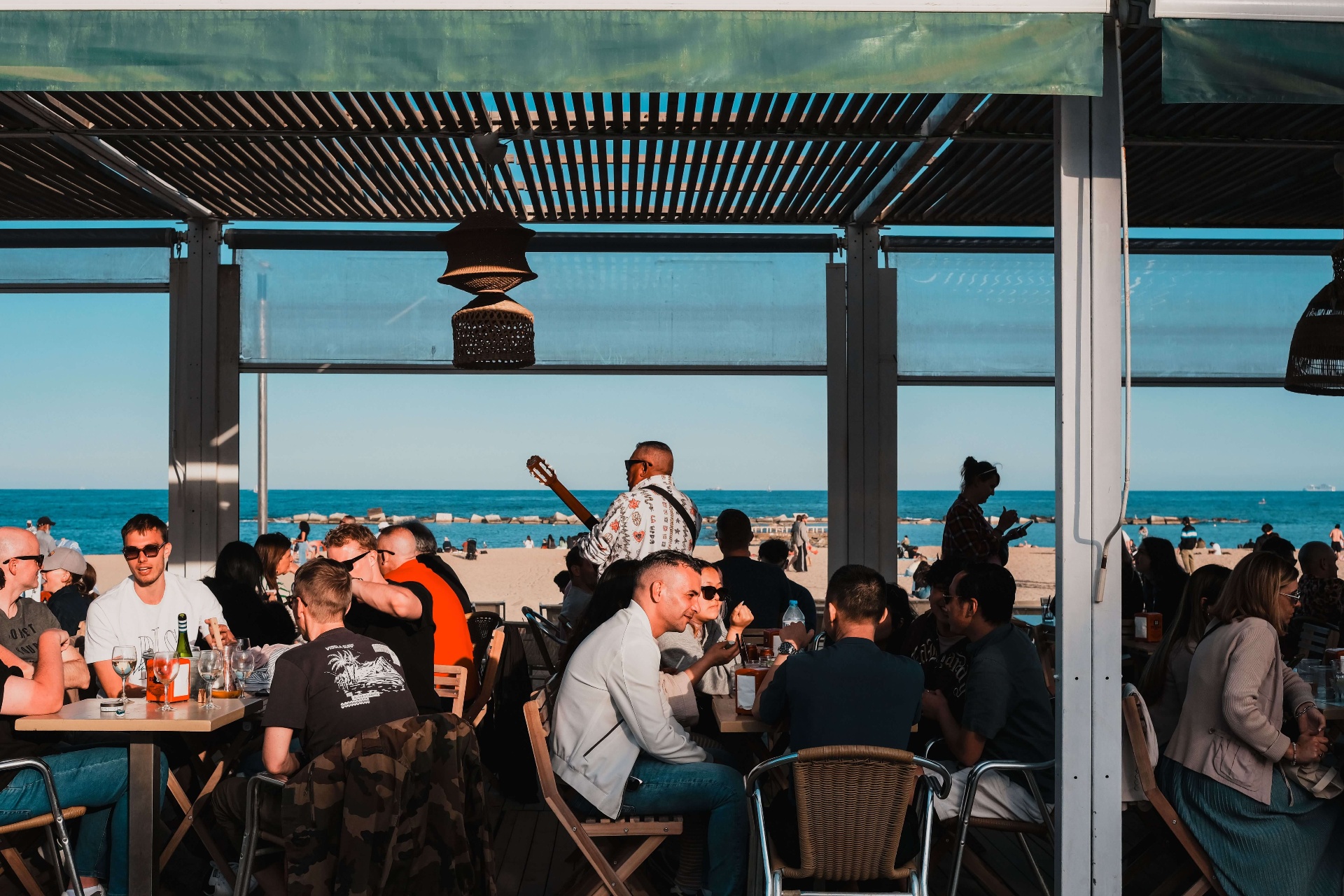 A Costa Brava chiringuito on the sand at golden hour